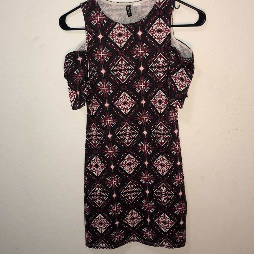 red, white. Black patterned dress